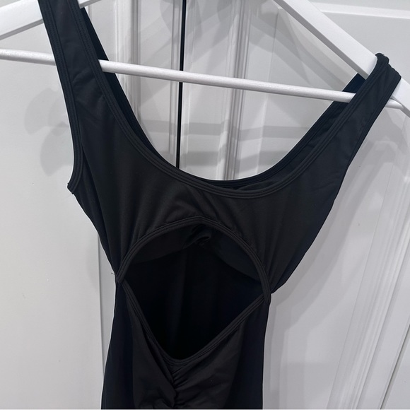 Trendy,  Backless Jumpsuit  Bodysuit with Flared Legs in Size Sm in Black - Picture 8 of 16